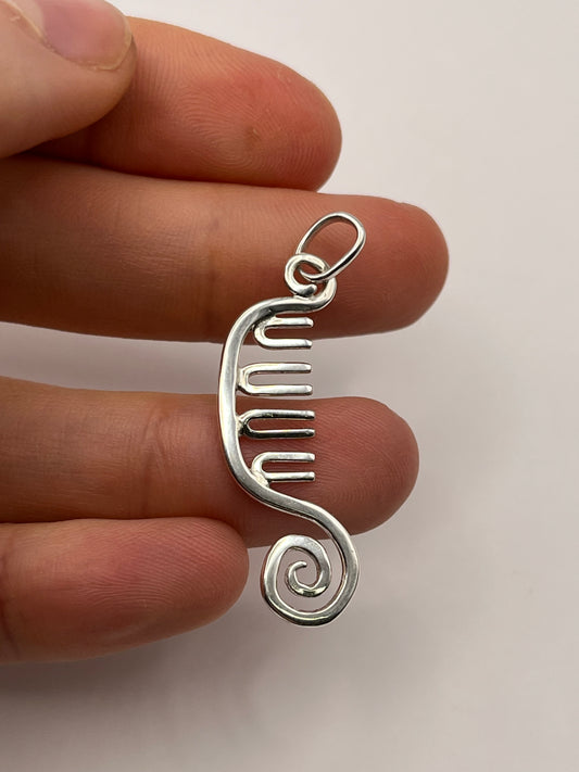 spiral comb pendant